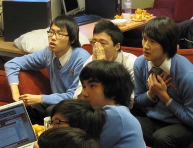  Korean students enthralled with the last fewminutes of a FIFA game